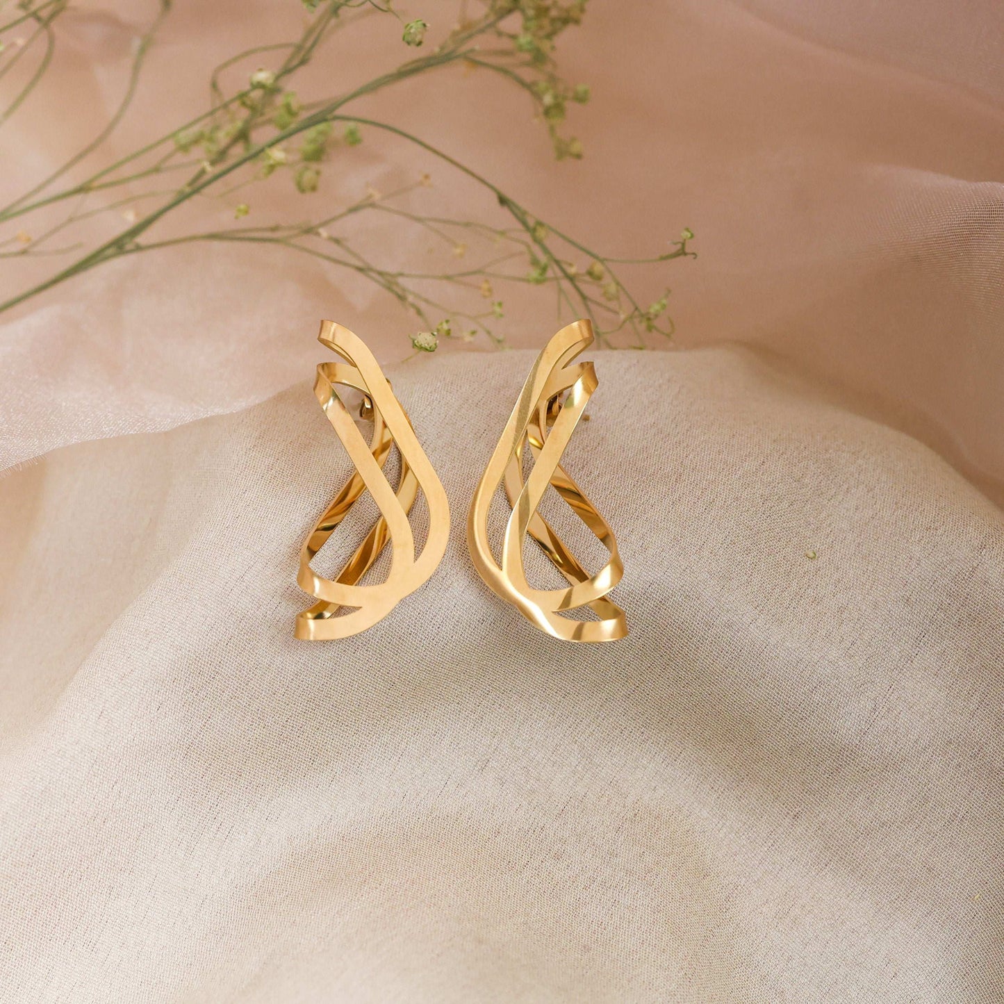 Sculptural Ribbon Drop Premium Earrings. - Bradiya