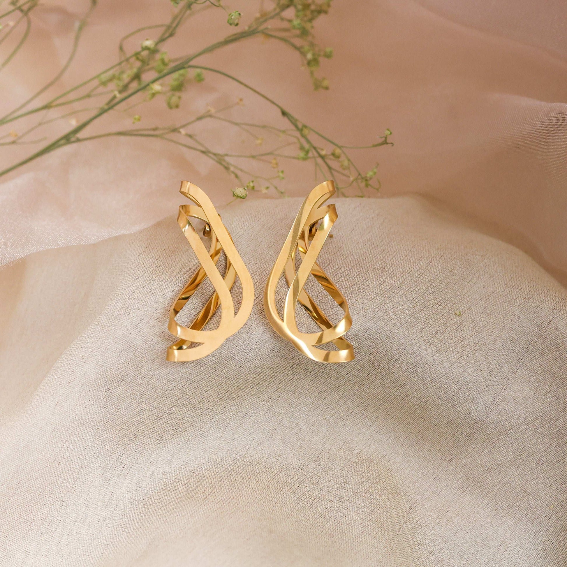 Sculptural Ribbon Drop Premium Earrings. - Bradiya