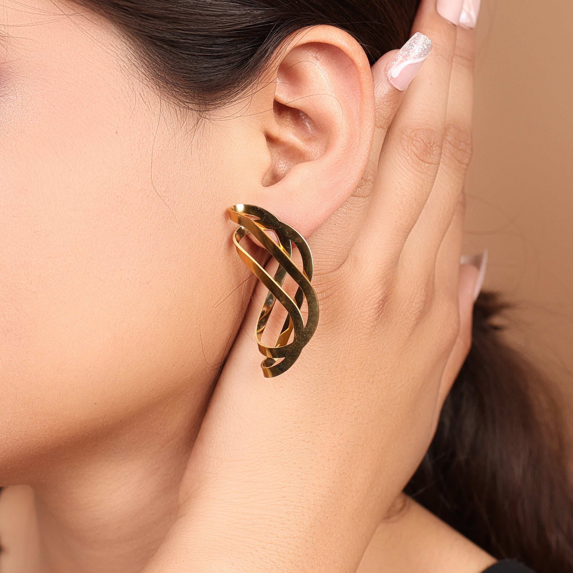 Sculptural Ribbon Drop Premium Earrings. - Bradiya